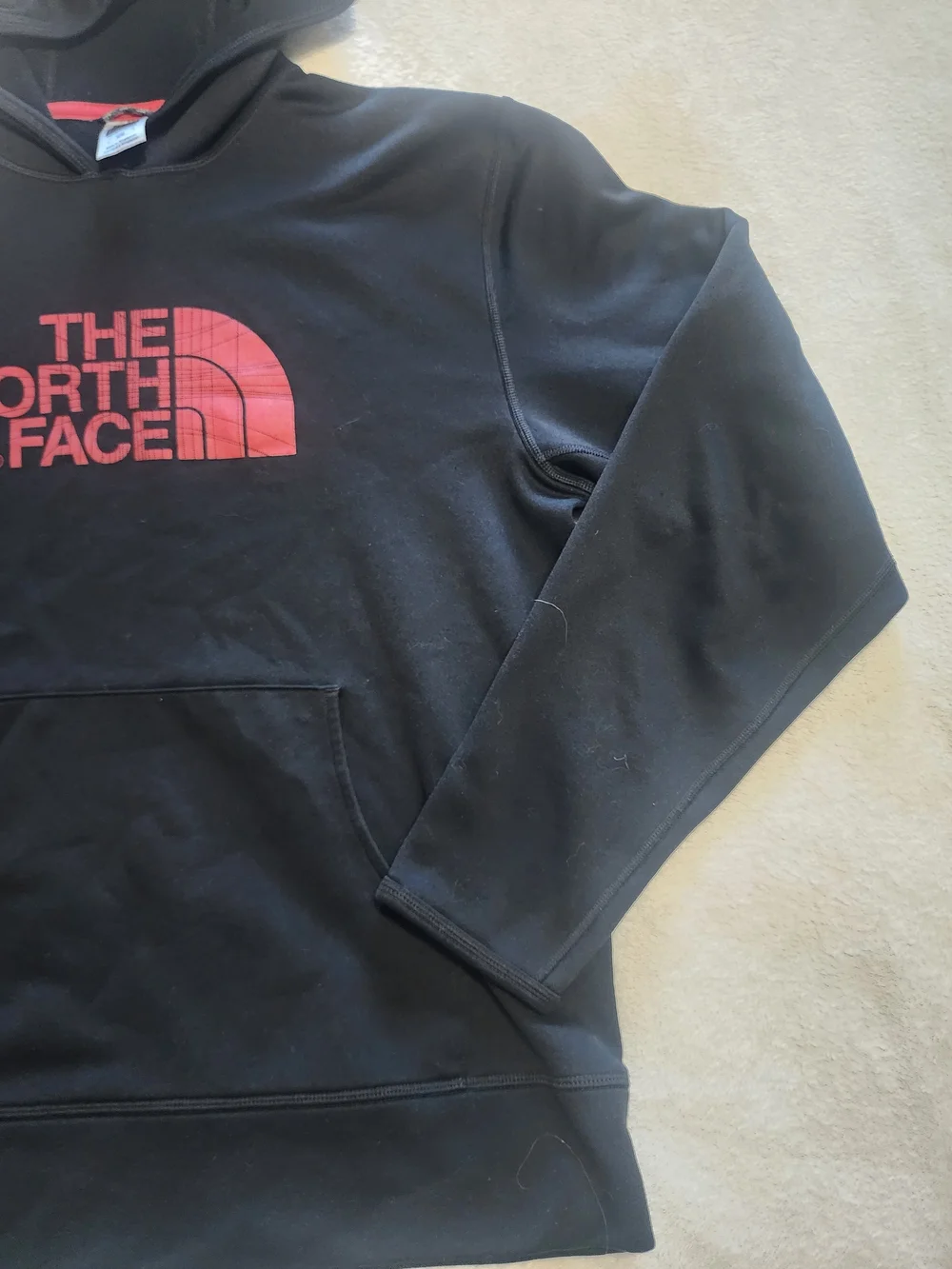 The North Face Black Hoodie with Red Logo